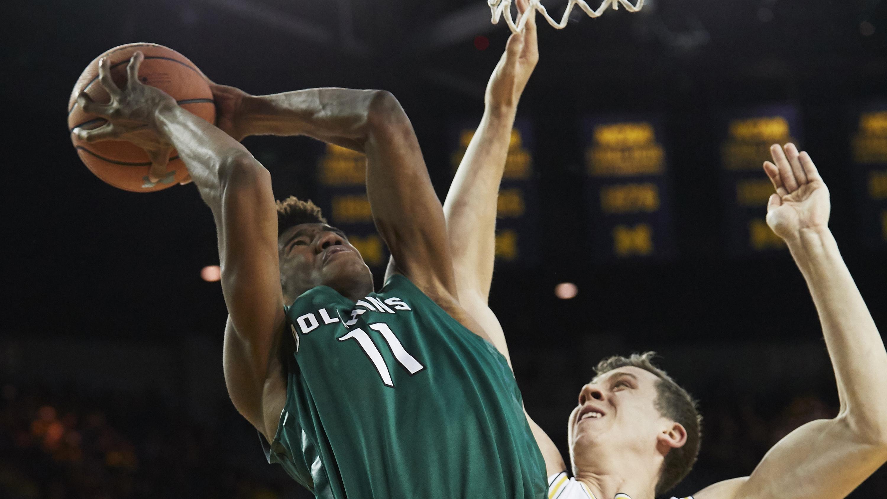 Jacksonville's Jalyn Hinton shoots against Michigan