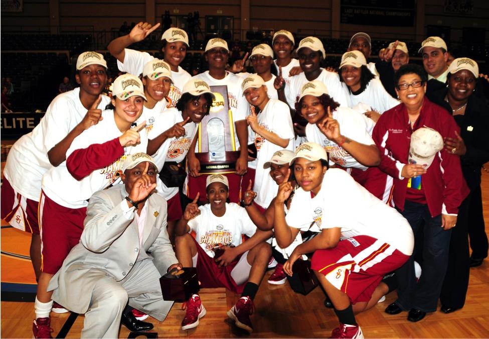 Shaw celebrates the 2012 DII women's basketball championship.