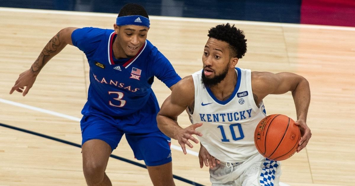 Kentucky's Davion Mintz drives against Kansas.