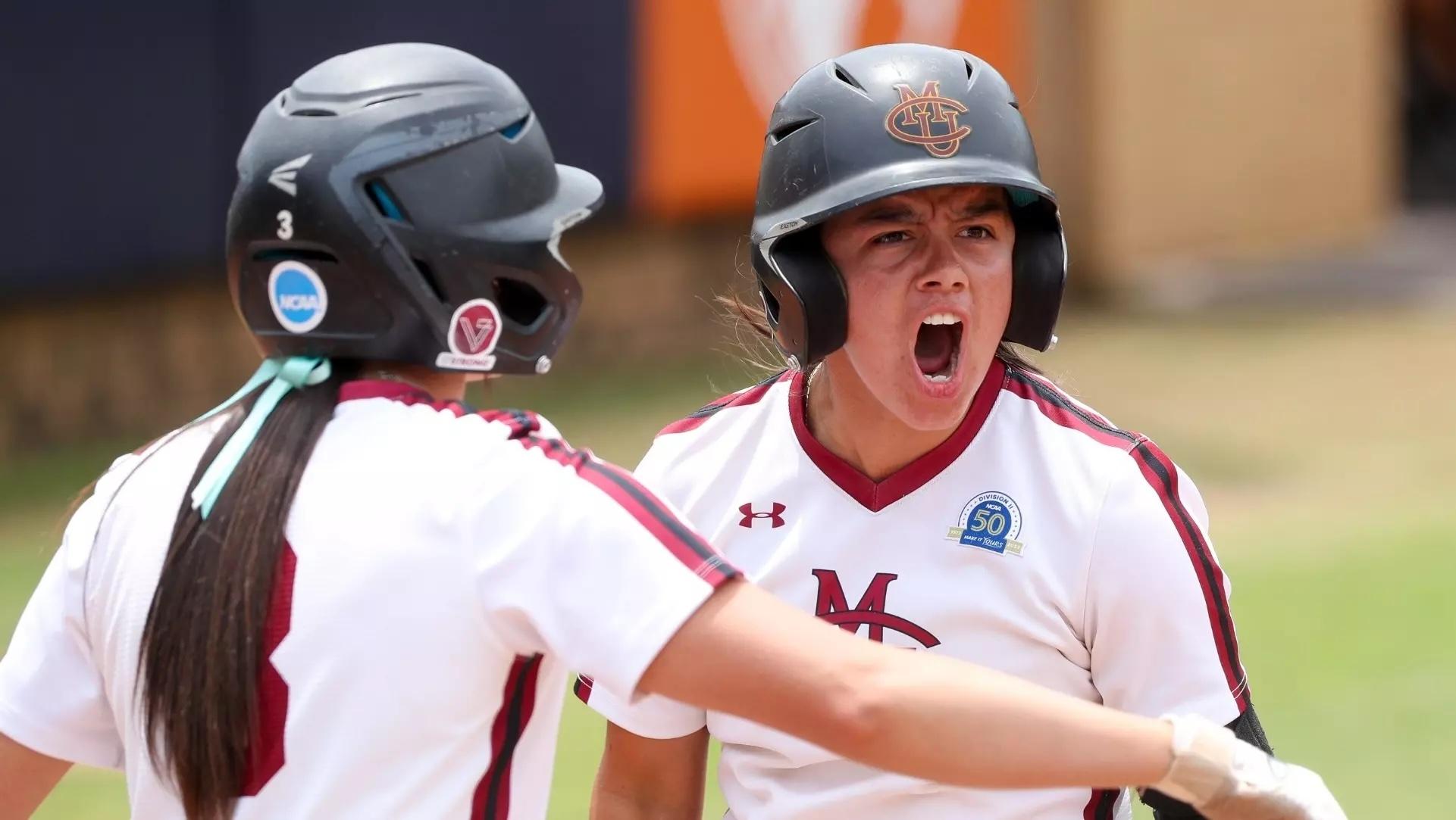 Myah Arietta celebrates at home plate for Colorado Mesa. 
