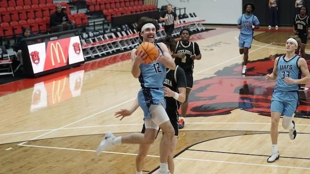 UAFS soars to the basket during an 11-0 start to the DII men's basketball season.
